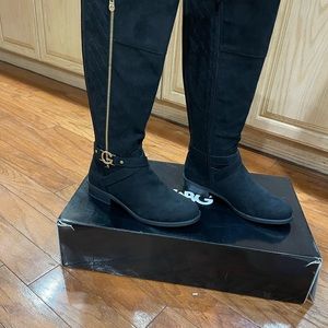 Beautiful knee high Guess boots.